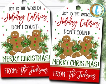 May include: Two gingerbread men cookies on a white background with green pine branches and red and green confetti. The text reads "Joy to the world! Holiday Calories Don't Count! Merry Christmas! From: The Jacksons".