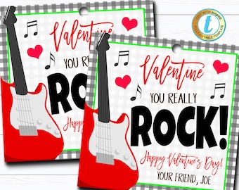 May include: Two printable Valentine's Day gift tags featuring a red electric guitar with a black neck and white pickguard. The text on the tags reads "Valentine You Really Rock! Happy Valentine's Day! Your Friend, Joe".