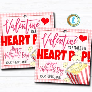 May include: Two pink and white gingham Valentine's Day gift tags with a red heart and popcorn. The text on the tags reads "Valentine You Make My Heart Pop! Happy Valentine's Day Your Friend, Jane".
