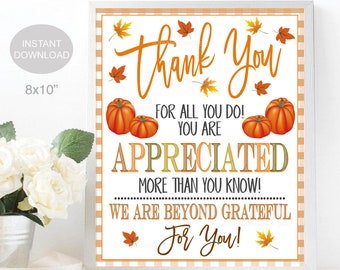 May include: A printable 8x10 inch sign with a white background and a brown and white checkered pattern. The sign says "Thank You for all you do! You are appreciated more than you know! We are beyond grateful for you!" with fall leaves and pumpkins.