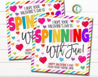 May include: Two printable Valentine's Day cards with a rainbow striped background and hearts. The text on the cards reads "I hope your Valentine's Day is Spinning with Fun!" and "Happy Valentine's Day from your friend, Jane".