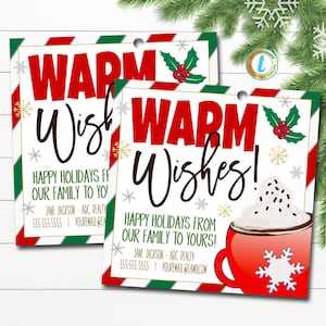 May include: Two red and green striped gift tags with the text "Warm Wishes!" and a graphic of a cup of hot chocolate with whipped cream. The text "Happy Holidays from our family to yours!" is also included on the tags, along with contact information for Jane Jackson - ABC Realty.