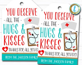 May include: Two white gift tags with a teal border and red and blue text. The tags say "You deserve all the hugs and kisses. Thanks for all you do! From the Jackson family."  The tags have a red heart with a plus sign, a stethoscope, and a clipboard with an Rx on it.