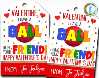 May include: Two printable Valentine's Day gift tags featuring a red ball with the text "I have a ball being your friend!" and "Happy Valentine's Day". The tags are decorated with colorful polka dots and hearts.