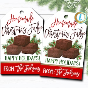 May include: Two white gift tags with red and green trim. The tags feature a festive design with fudge, holly, and the text "Homemade Christmas Fudge" and "Happy Holidays!"  The bottom of the tags say "From: The Jacksons".