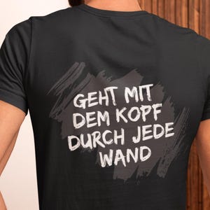 Statement T-Shirt for Men | Goes headfirst through any wall | Unisex shirt with saying | Funny gift for men | Men&#39;s shirt