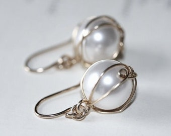 Swarovski pearl earrings wrapped in sterling silver wire