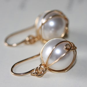 Swarovski pearl earrings wrapped in 14K gold filled wire