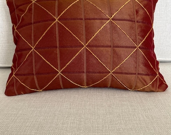 Burnished copper pillow cover