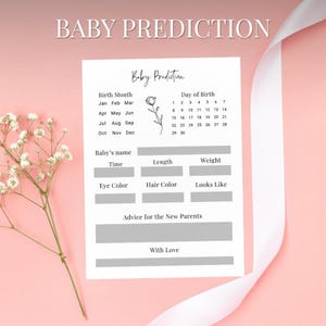 May include: A white baby prediction card with the text "BABY PREDICTION" at the top. The card includes sections for birth month, day, baby's name, length, weight, eye color, hair color, and advice for parents. A sprig of flowers and a white ribbon are in the background.
