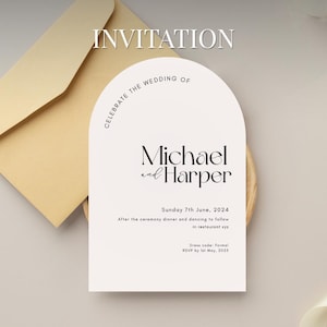 May include: A wedding invitation with a cream-colored arch design. The text reads "INVITATION", "Celebrate the Wedding of Michael and Harper", and event details. An envelope is visible in the background.