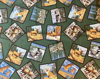 STAMPA CARTOLINA FAUNA SELVATICA di Lincoln Textiles Venduto a mezzo metro x 45" di larghezza Tessuto per trapuntatura in cotone verde scuro
