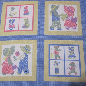 May include: A blue and yellow fabric with a white background featuring a repeating pattern of children in various activities. The children are wearing hats and dresses with floral patterns. The fabric is perfect for quilting or crafting projects.