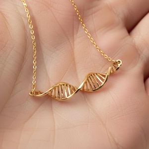 Collar de doble hélice de ADN hecho a mano en plata de ley – Joyería minimalista científica