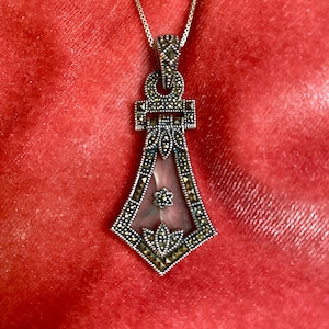 Judith Jack Vintage Camphor glass pendant with art deco marcasite accents set in Sterling Silver on a sterling silver chain.