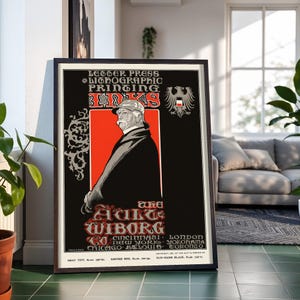 May include: A framed vintage advertisement poster for Ault & Wiborg Co. letter press and lithographic printing inks. The poster features a central illustration of a man in a military-style helmet and coat against a red and black background.