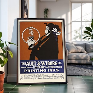 Może przedstawiać: Oprawiony plakat reklamowy w stylu vintage dla The Ault & Wiborg Co. z ilustracją profilu osoby z długimi ciemnymi włosami trzymającej okrągły emblemat z herbem lwa. Tekst brzmi: THE AULT & WIBORG CO. MANUFACTURERS OF LETTER-PRESS AND LITHOGRAPHIC PRINTING INKS, z listą miast, w tym Cincinnati, New York, Chicago, St. Louis, Buffalo, Philadelphia, San Francisco, Toronto, Havana, City of Mexico, Buenos Aires i London.