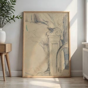 May include: A framed pencil sketch artwork featuring architectural elements. The artwork is primarily in shades of gray and blue, with a light beige background. The wooden frame adds a natural touch to the piece, suitable for home decor.