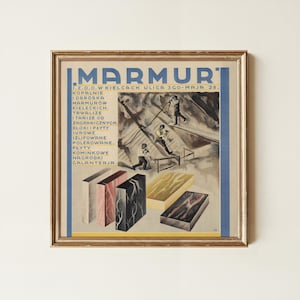 May include: A framed vintage advertisement poster titled MARMUR featuring illustrations of workers in a quarry and various marble blocks in white, pink, black, and yellow. The text includes J.Z.O.O.W KIELCACH ULICA 3GO-MAJA 28 and lists marble products.