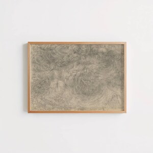 May include: A framed artwork featuring a detailed pencil drawing. The artwork showcases swirling, abstract patterns in shades of gray, encased in a light brown wooden frame. The drawing's intricate details create a textured appearance, suitable for wall decor.