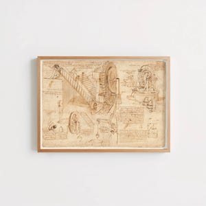 May include: A framed sepia-toned print featuring a technical drawing of mechanical gears, a screw mechanism, and various engineering components. The artwork includes handwritten notes in Italian script alongside detailed sketches of machinery.