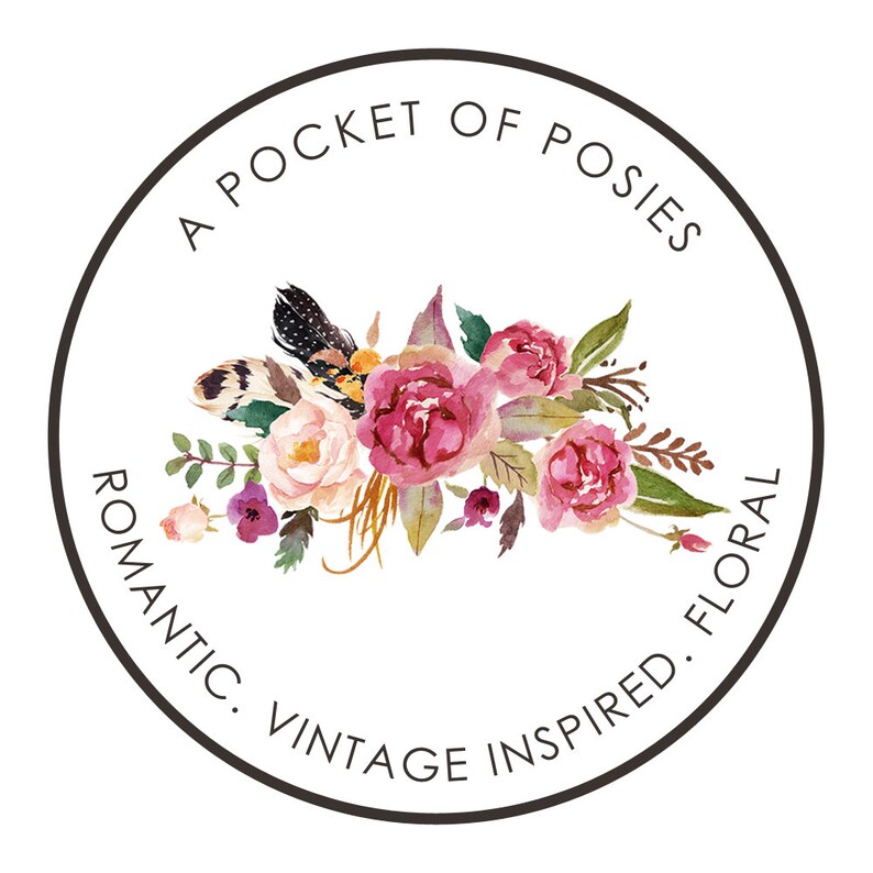 May include: A circular logo with the text "A Pocket of Posies Romantic. Vintage Inspired. Floral" in a black circle. The logo features a watercolor illustration of a bouquet of pink and white flowers with a feather.