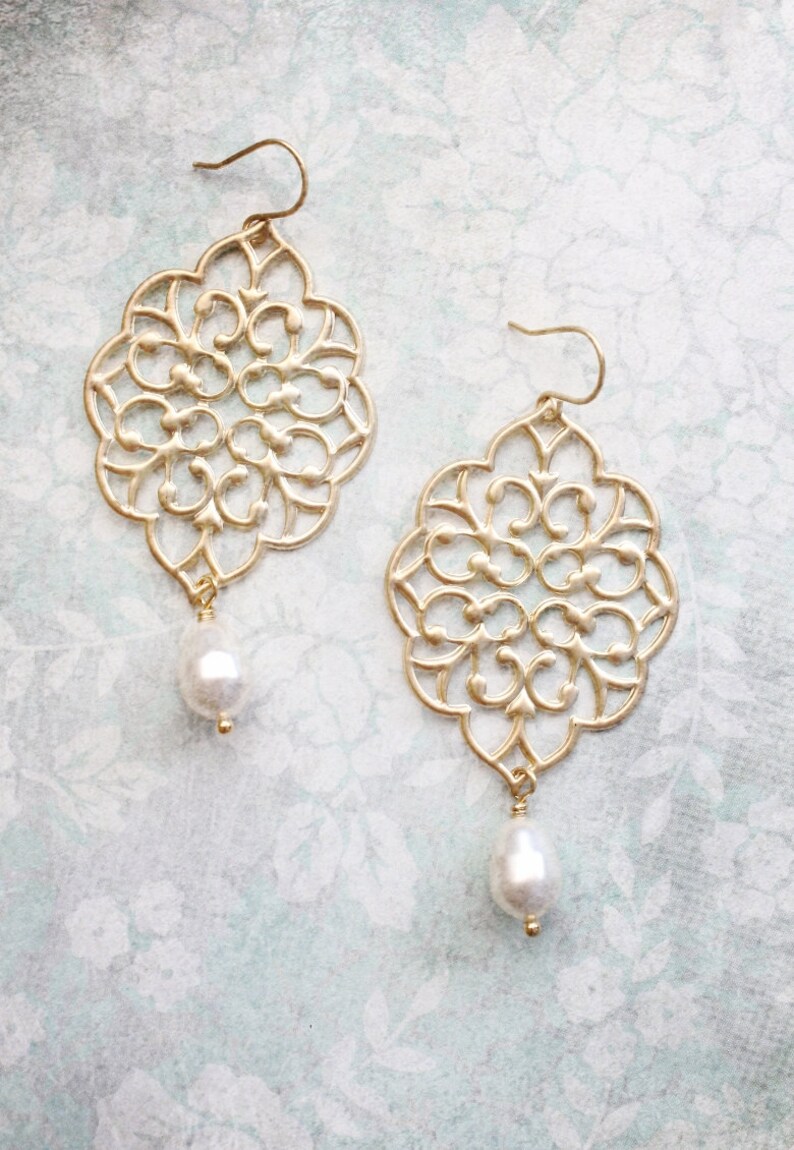 80's Matte Gold Filigree Dangle Clip On Earrings main image 0