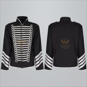 May include: Black military-style jacket with silver and white accents. The front features decorative silver trim and a gold emblem. The sleeves have white stripes. The back of the jacket has a gold emblem and the text "PHOENIX BLAZE CRAFT".