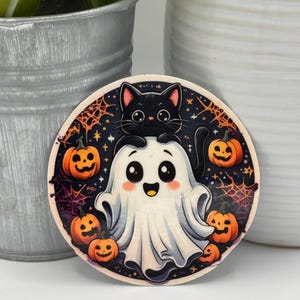 Ghost Kitty Halloween Sticker – Cute Black Cat in Ghost Costume with Pumpkins | Kawaii Fall Vinyl Sticker for Planners, Laptops, Kawaii
