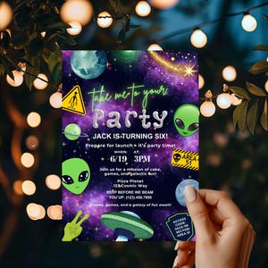 Peut inclure: Une invitation de fête sur le thème cosmique. L'invitation présente le texte "Take me to your Party" et "Jack is turning six!" avec des graphiques sur le thème des extraterrestres et de l'espace. La date et l'heure sont indiquées comme le 19/6 à 15h00.