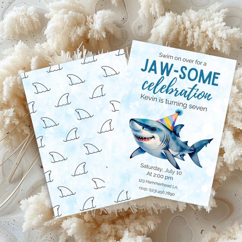 May include: A set of two party invitations. One features a shark wearing a party hat with the text "JAW-SOME celebration" and event details. The other has a pattern of shark fins on a light blue background.