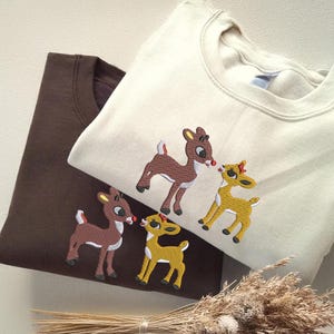 Christmas Embroidered Sweatshirt: Retro Reindeer Design, Rudolph The Red Nose Reindeer and Clarice, Fall Embroidered Sweatshirt.