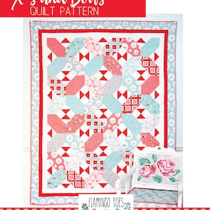 May include: A quilt pattern called "X's and Bow's" by Flamingo Toes Designs. The quilt is made with a variety of fabrics in pink, red, blue, and white. The quilt is 63 inches by 79 inches.