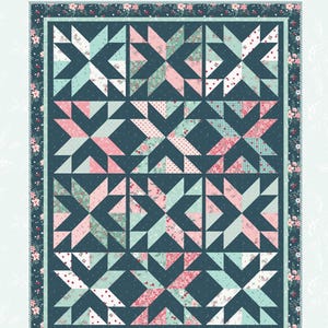 May include: A quilt pattern called "Stacking Stars" by Beverly Me Cullough of Flamingo Toes. The quilt is made up of a grid of teal blue squares with pink and green stars. The quilt is 65 inches by 82 inches.