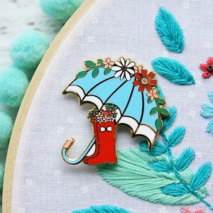 Parapluie fleuri et bottes de pluie Magnetic Needle Minder