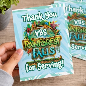 May include: A printable thank you card featuring the text Thank You VBS Rainforest Falls for Serving! The design includes a colorful quetzal bird, tropical foliage, and butterflies set against a light blue background with white leaf patterns.