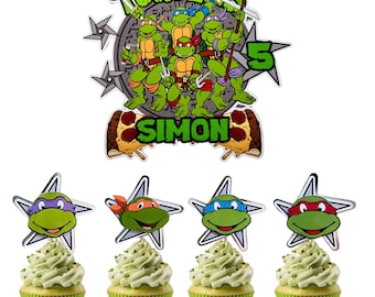 May include: A Teenage Mutant Ninja Turtles themed cake topper with the number 5 and the name "SIMON". Four cupcakes with green frosting and star-shaped toppers featuring the turtles' faces are also shown.
