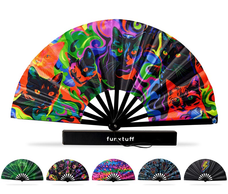 May include: A large hand fan featuring a vibrant, psychedelic print of multiple cats in shades of neon green, orange, blue, and black. The fan has black ribs and a black handle with the text "furxtuff" printed in white on the base.