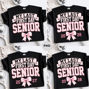 May include: A black crewneck sweatshirt featuring the text MY LAST FIRST DAY SENIOR in light pink block lettering. Below the text is a light pink bow graphic. Some versions include the years 2026, 2027, or 2028 flanking the bow.