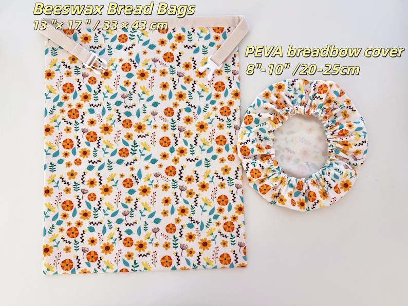 Op de afbeelding: Bijenwas broodzakken en een PEVA broodhoes. De tassen zijn wit met een bloemenpatroon in oranje, geel en teal. De broodzakken zijn 33 x 43 cm. De broodhoes is 20-25cm.