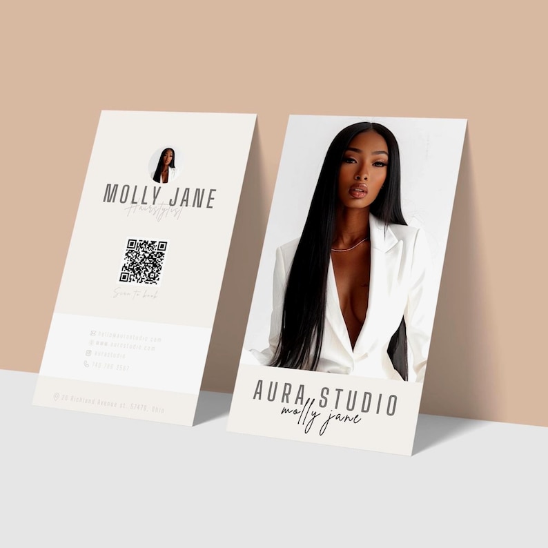 May include: Two business cards with a light beige background. One card features the text "MOLLY JANE HairStyling" and a QR code. The other card displays a woman in a white blazer with the text "AURA STUDIO molly jane".