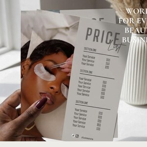 Hand holding the beige lash price list template sheet showing the editorial lash extension close-up photo and three service pricing sections beside a marble column; editable Canva lash beauty service menu flyer for extension volume classic hybrid appointment sheet digital download.
