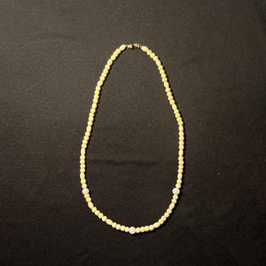 Ivory and blue glass beaded necklace