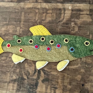 A Brown Trout Penny Rug
