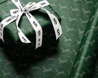Papier cadeau renne vert : motif chevreuil des Fêtes, brillant ou mat