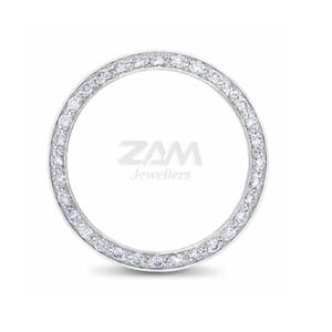 May include: A circular ring with a band of small, sparkling diamonds. The ring is set against a white background. The text "ZAM Jewellers" is in the center of the ring.