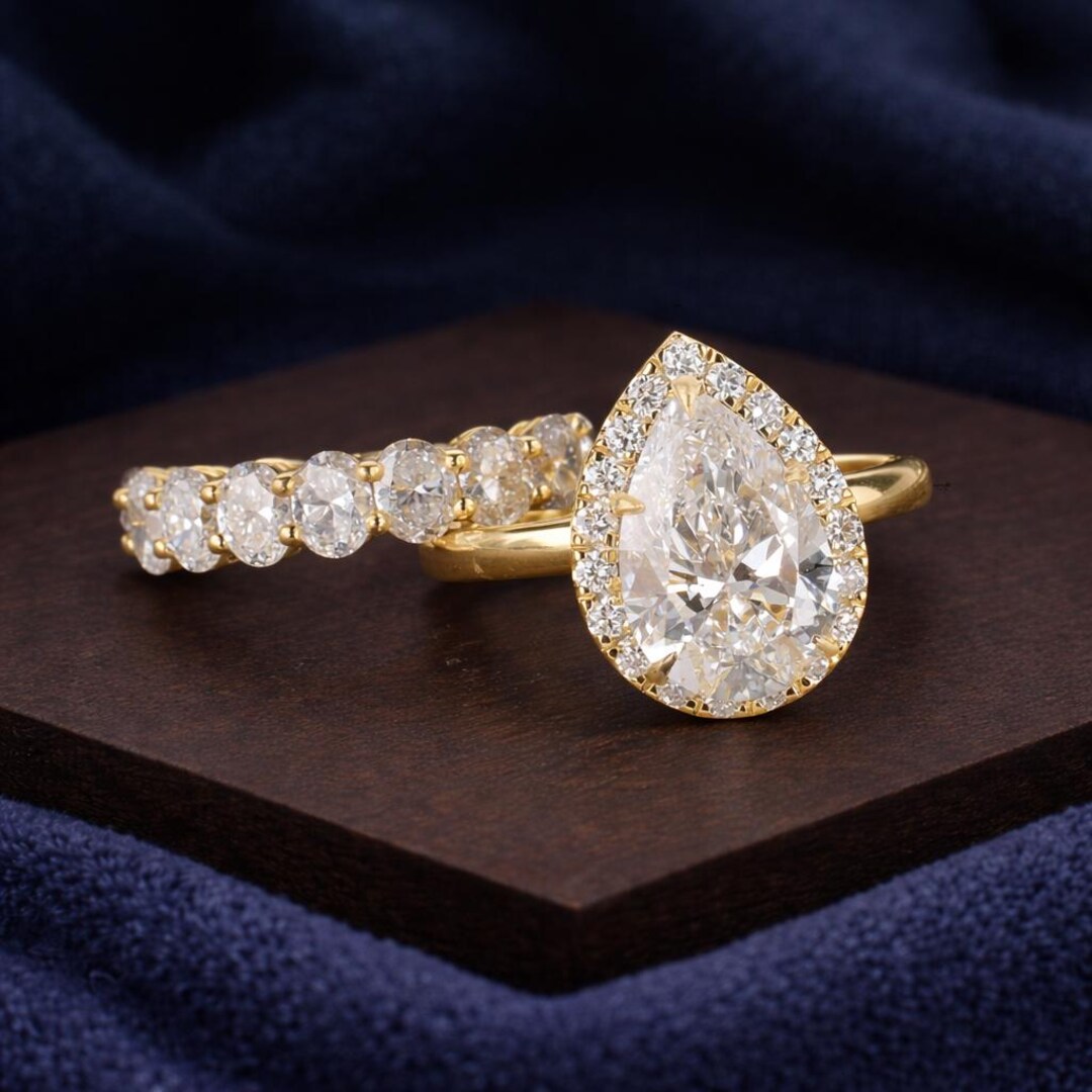 Pear Cut Moissanite Engagement Ring Set in Yellow Gold With Oval ...