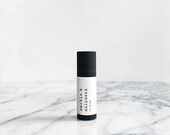 rosy lip tint - organic sesame, coconut, beeswax, scented with organic rose otto & rose geranium