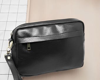 Bolso de mano Oxford de piel negra premium para hombre, sofisticado organizador de viaje de mano, portafolios de negocios minimalista.
