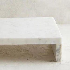 Marble kitchen tray styled with snacks and candles